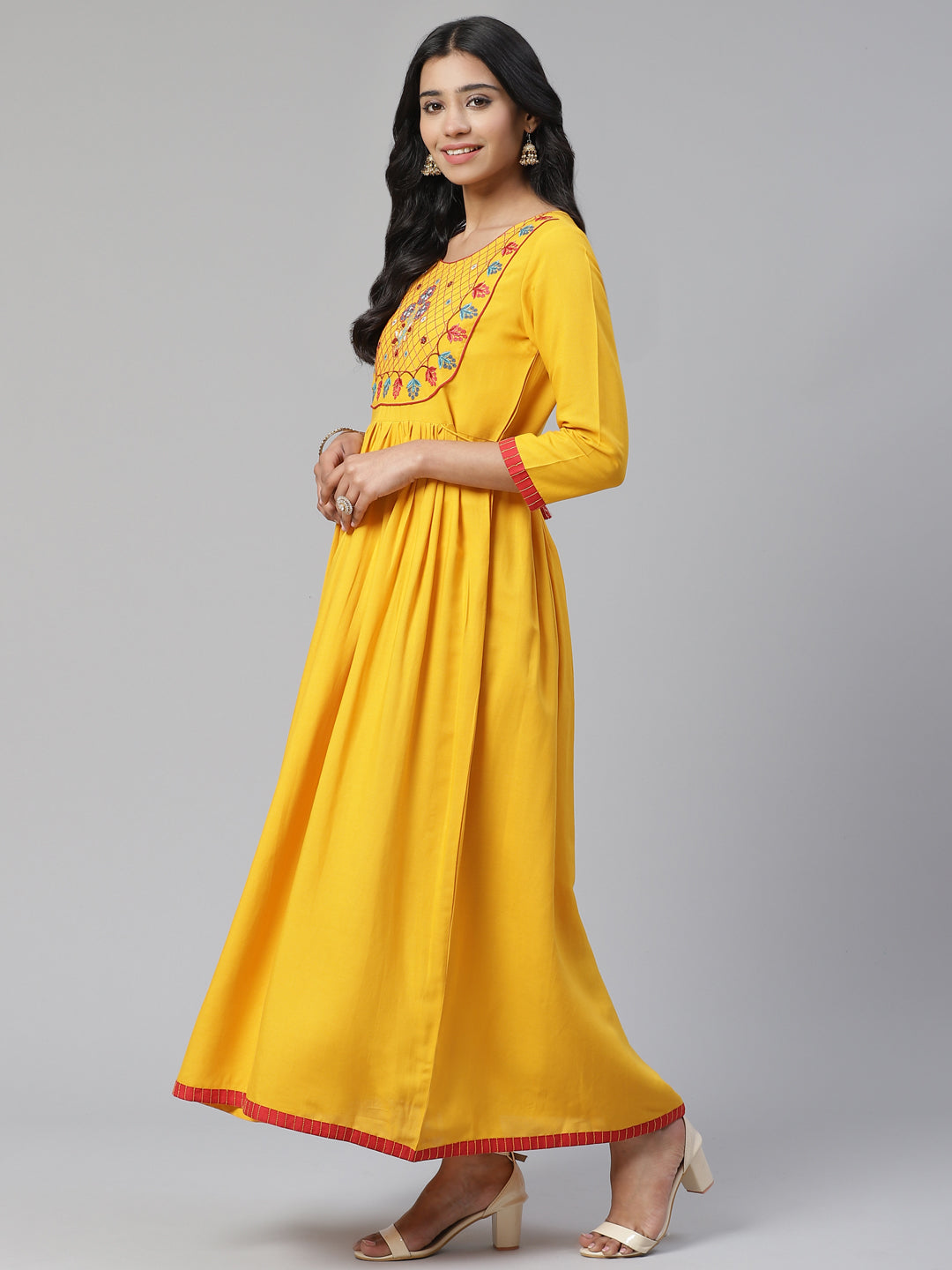 Women Yellow Embrodiered Thread work Long Kurta