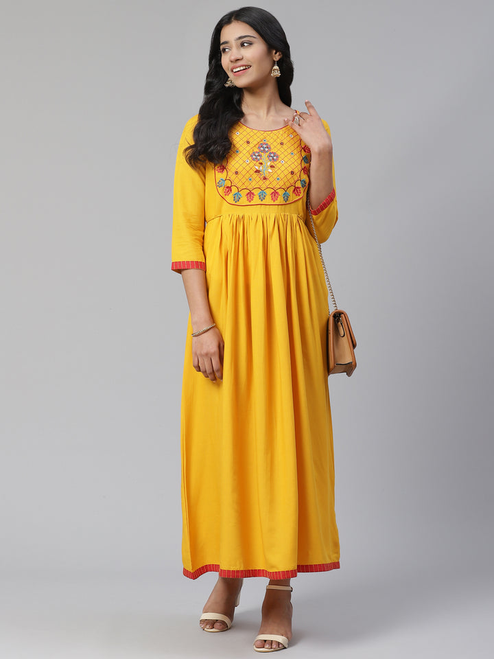 Women Yellow Embrodiered Thread work Long Kurta