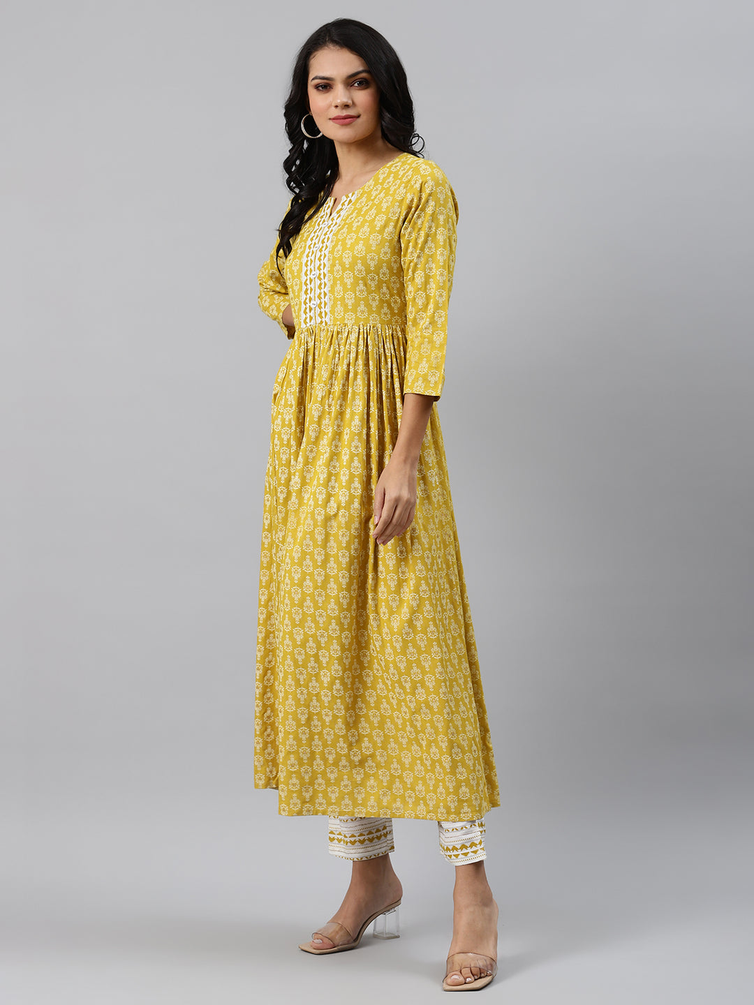 Women Yellow and White Flared Kurta with Trousers