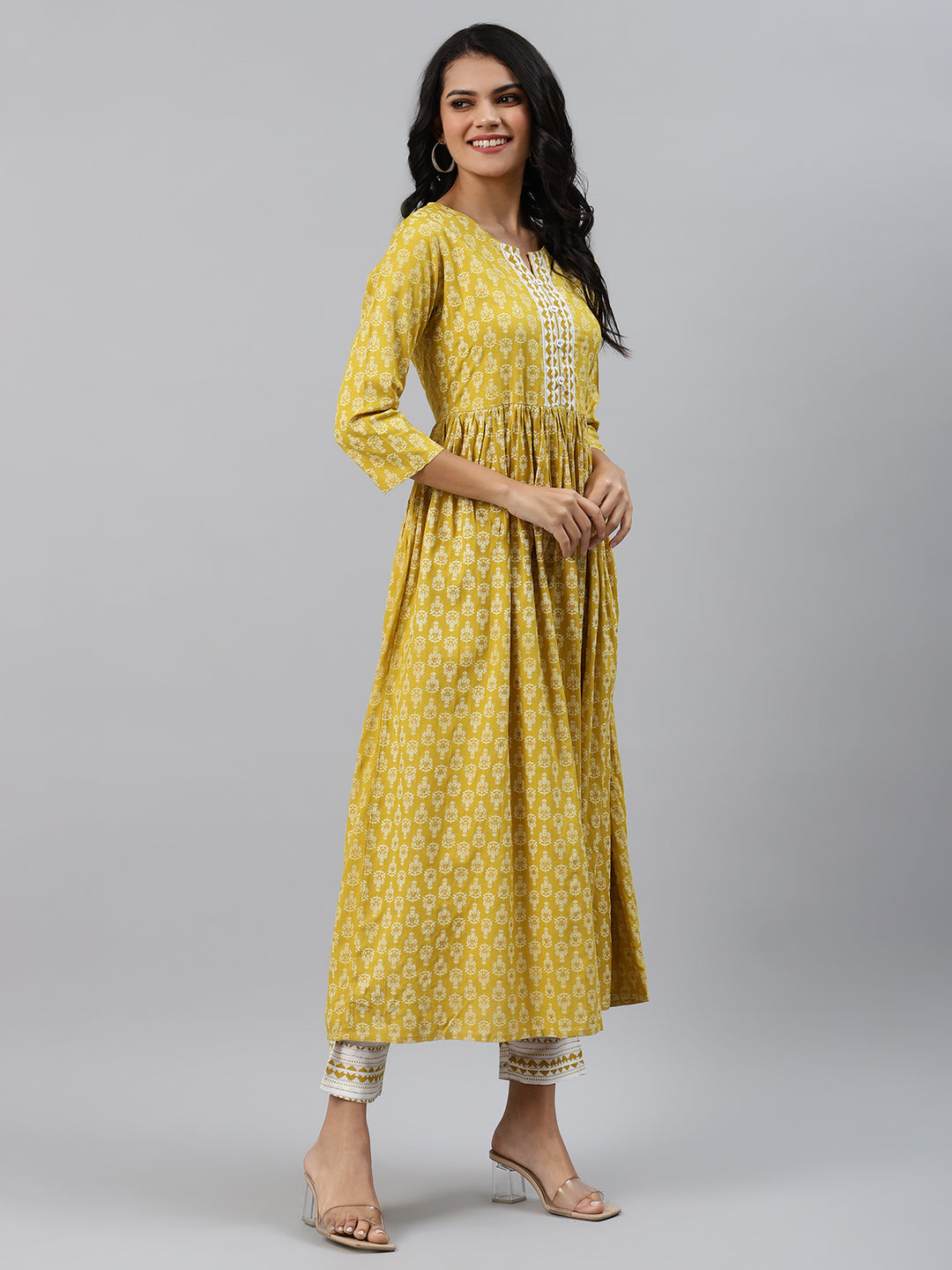 Women Yellow and White Flared Kurta with Trousers