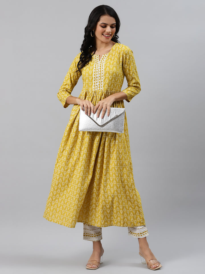 Women Yellow and White Flared Kurta with Trousers