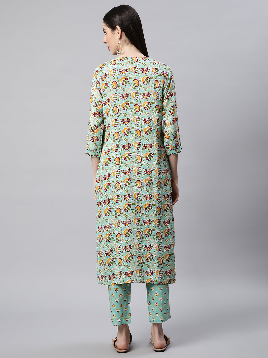 Women Green Printed Hand detailing Kurta with Trousers